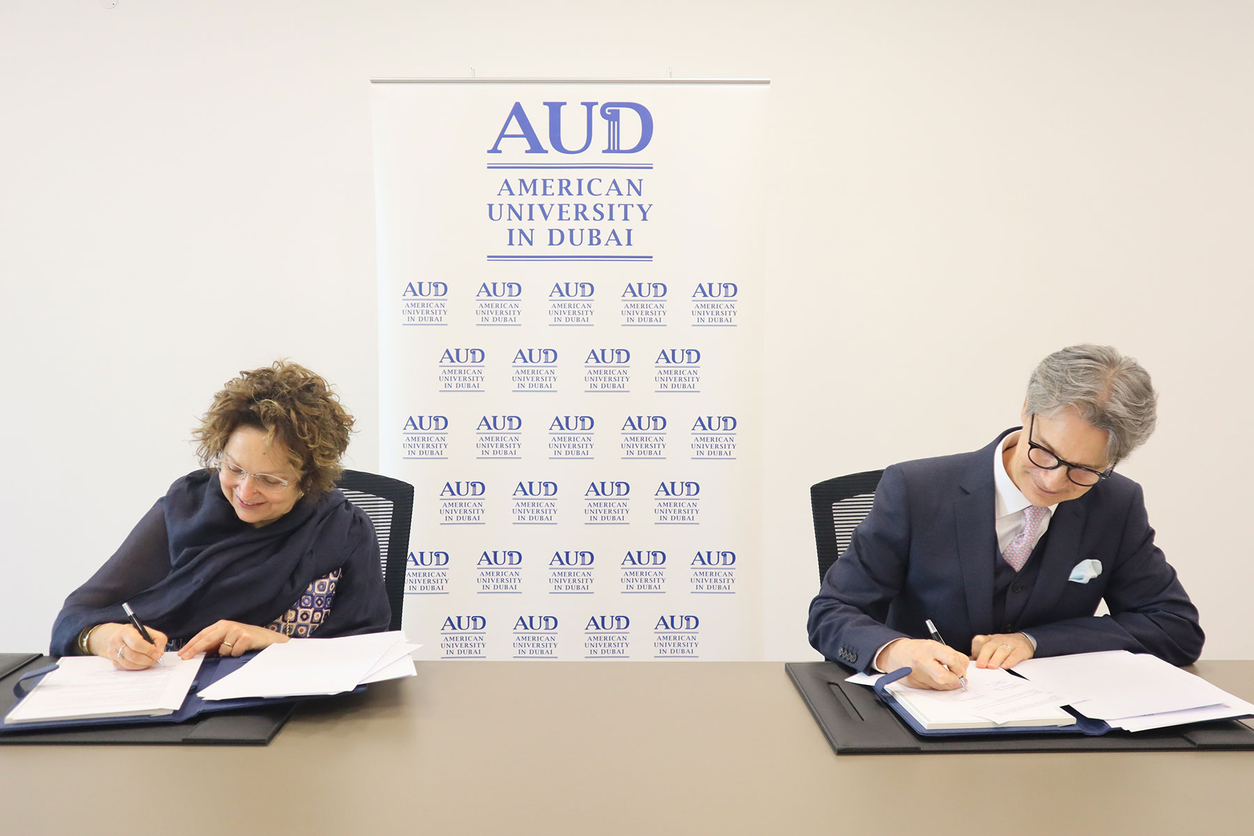MOU by Dr. David A. Schmidt, President of AUD and Ms. Tiziana Lippiello, Rector, Ca' Foscari University of Venice